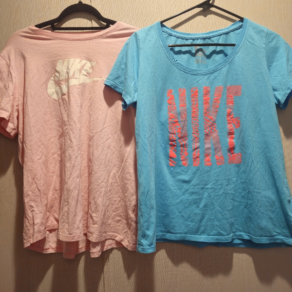 GUC 2 Women's Nike T-shirts. 1 Blue W/ Orange Accents & 1 Baby Pink.